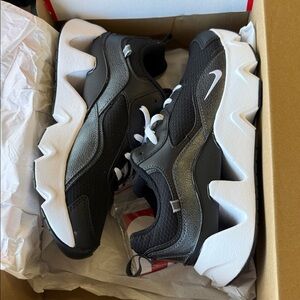 Nike women Black and White Sneakers